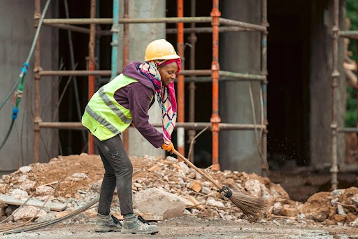 Fixa worker in Rwanda accessing earned wages via mobile